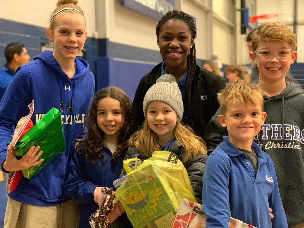 Each December, children in Abilene Christian School help by delivering busloads of gifts & household goods. Beginning a season of serving students in need. 