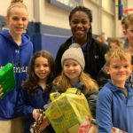 Each December, children in Abilene Christian School help by delivering busloads of gifts & household goods. Beginning a season of serving students in need. 