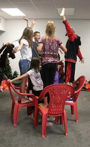 Actors in Center's TheaterArt Camp create a tree