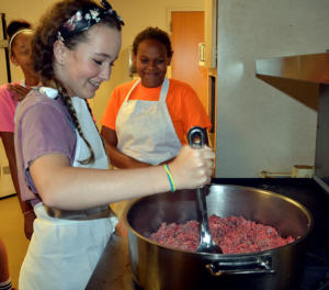 Molly Carroll, Jalea Bowman and Alexa Lubanga make lasagne at Culinary Camp